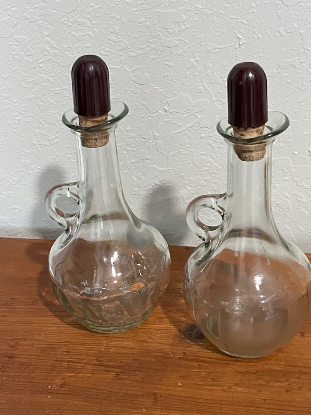 Clear Glass Bottle with Embossed Base